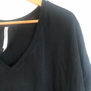 The Group by Babaton Oversized V-Neck T-Shirt